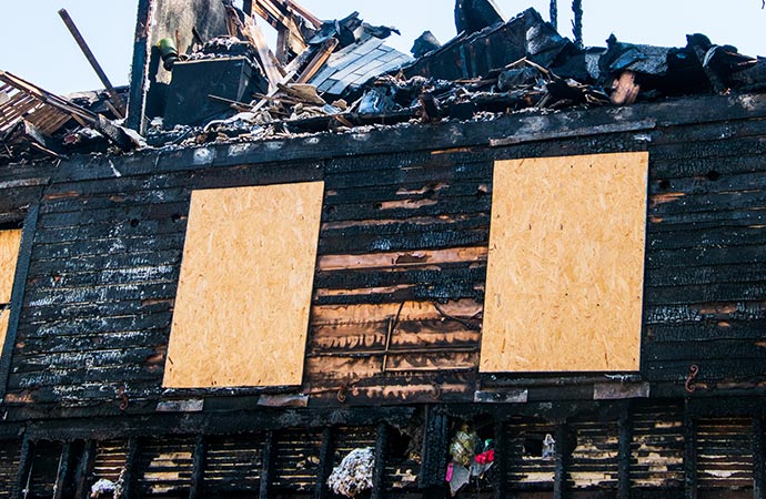 Board up service for a fire damaged house
