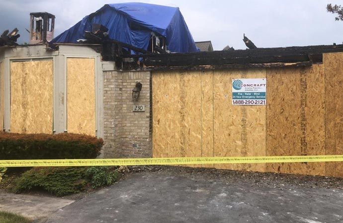 Boarded up house exterior