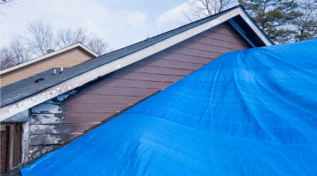 Tarp Over after Fire Damage in Michigan