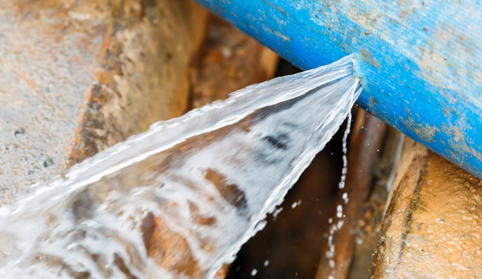 Water leaking from a broken pipe