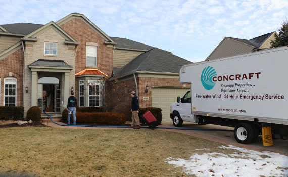 Professional expert restoring water and fire damaged area