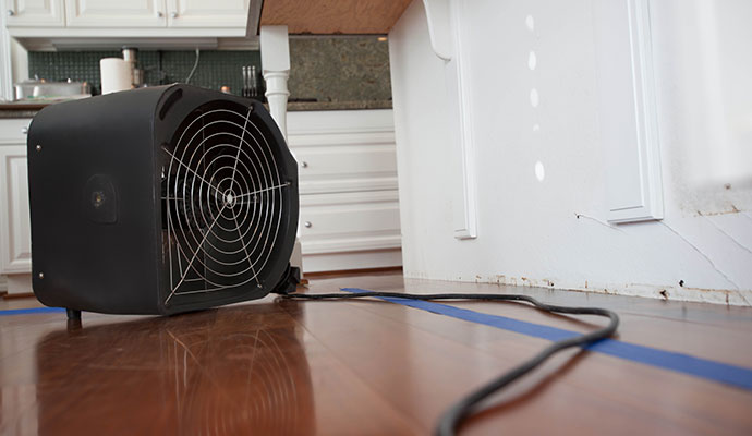 Water damage restoration for wooden floor